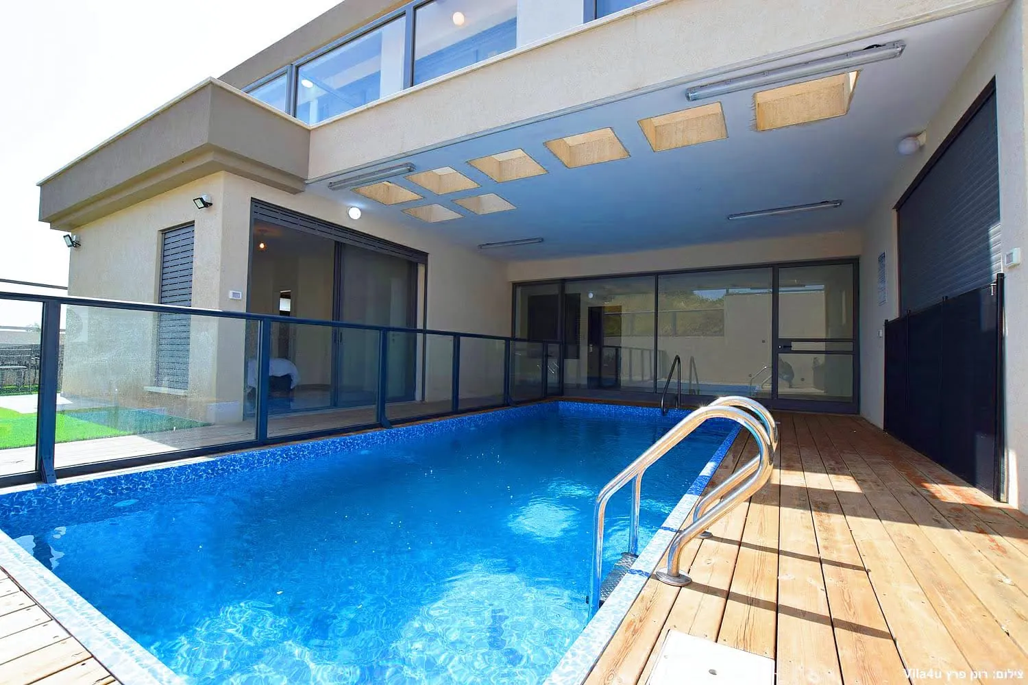 Kinneret House – the heated pool and wooden deck